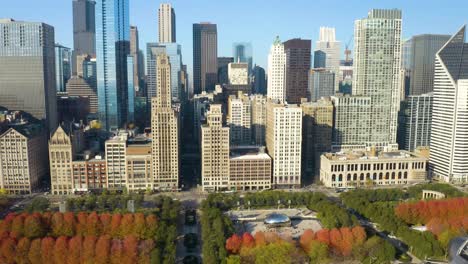 aerial sliding oribiting shot above cloud gate in millennium park