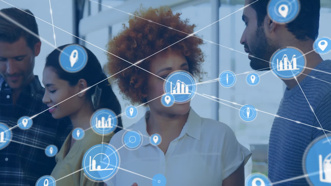 Animation of network of connections with icons over diverse colleagues discussing work in office