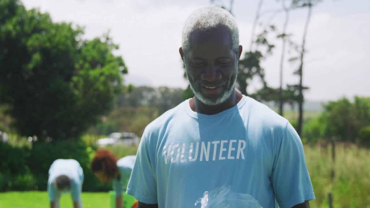 Volunteers collecting rubbish and recycling