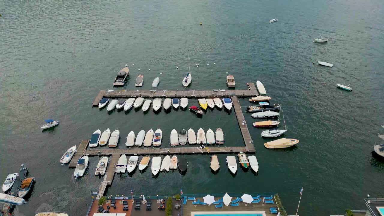 4K Aerial Drone Video of Boat Docking in the Marina on Beautiful Lake Como, Italy in the Summer