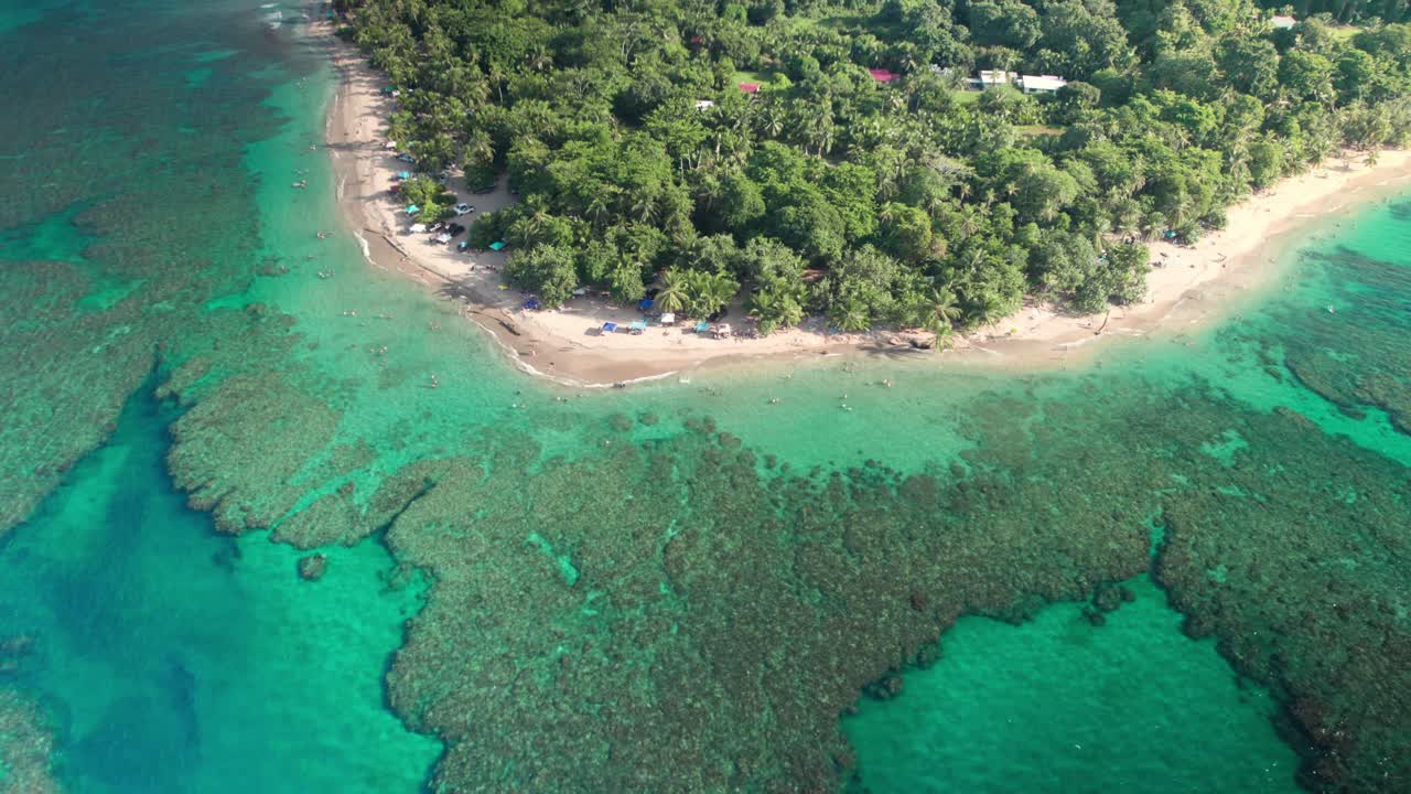 Orbit shot Uva beach with Coral and blue waters, Costa Rica