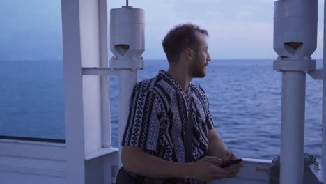 young man traveling on the sea.