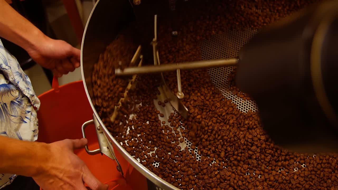 Man using coffee grinding machine