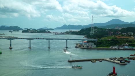 Bridge-And-Marina-At-Geojedo-Island-Against-Cloudscape-Sky-In-Gyeongsangnam-Do-Province,-South-Korea