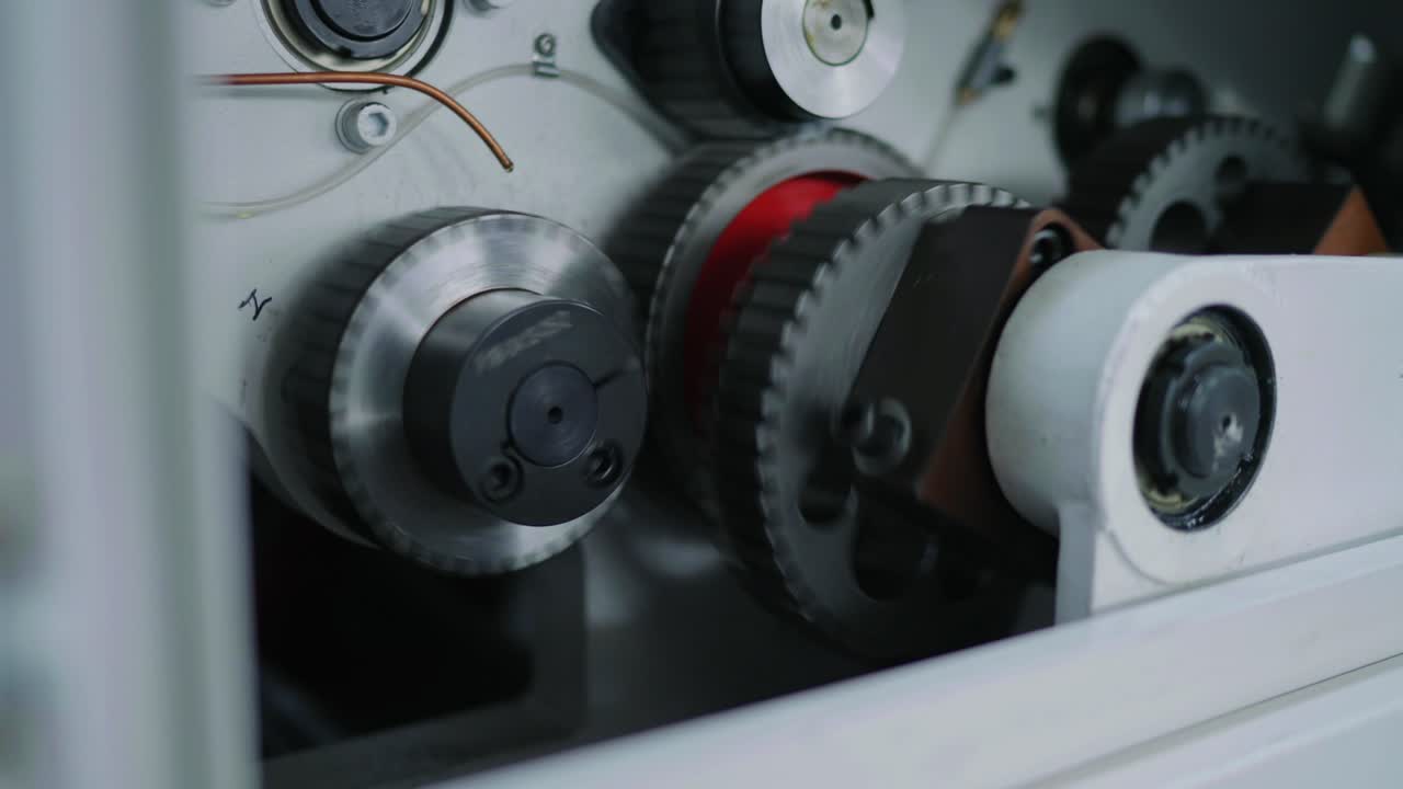 Machinery gears in precise motion, showcasing industrial engineering and mechanical operation