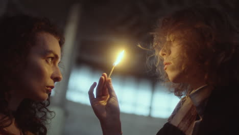 a shared moment illuminated by a match