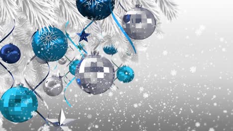 Animation-of-snow-falling-over-decorated-christmas-tree-branch-against-copy-space-on-grey-background