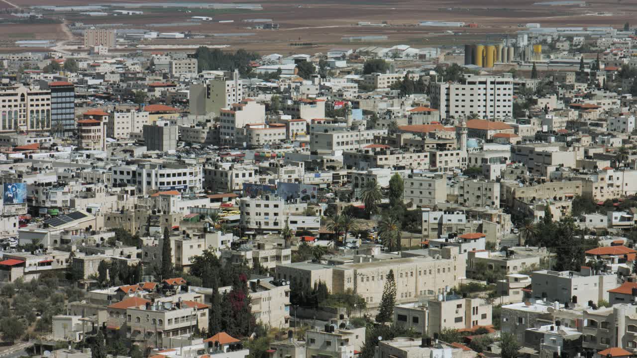 Cityscape with Dense Buildings and Open Fields