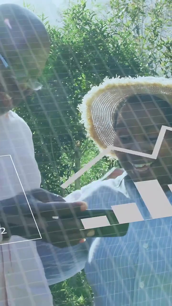 Vertical video: Woman and man tapping tablet in garden starting AR tech charts and collecting data