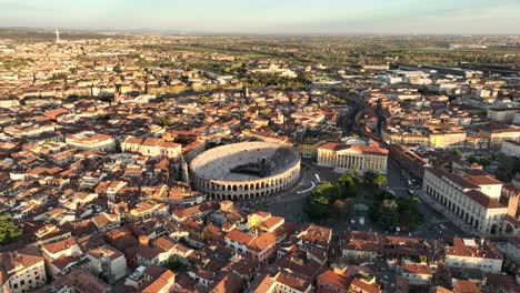 Aerial Drone view of Verona&#039;s Piazza Bra - City Center, Arena, Gran Guardia and City Hall - not graded