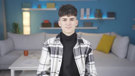 young man with poor eyesight wears glasses to blurry eyes.