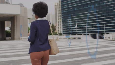 animation of business data over african american woman using smartphone