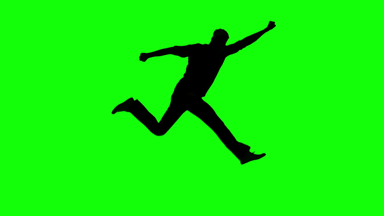 silueta de un hombre gestando como superman en la pantalla verde