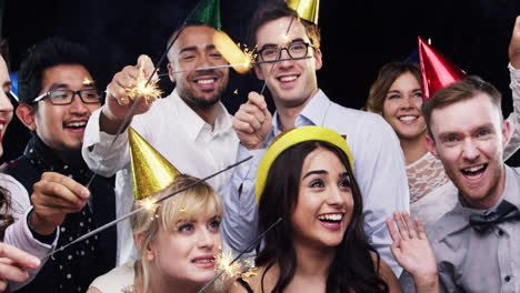 Mixed-race-group-of-friends-celebrating-independence-day-slow-motion-party-photo-booth