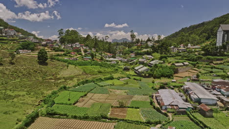 nuwara eliya sri lanka aerial v3 cinematic low drone flyover along a5 pbc highway towards golf course capturing hillside residential houses, circuit bungalows - shot with mavic 3 cine - april 2023