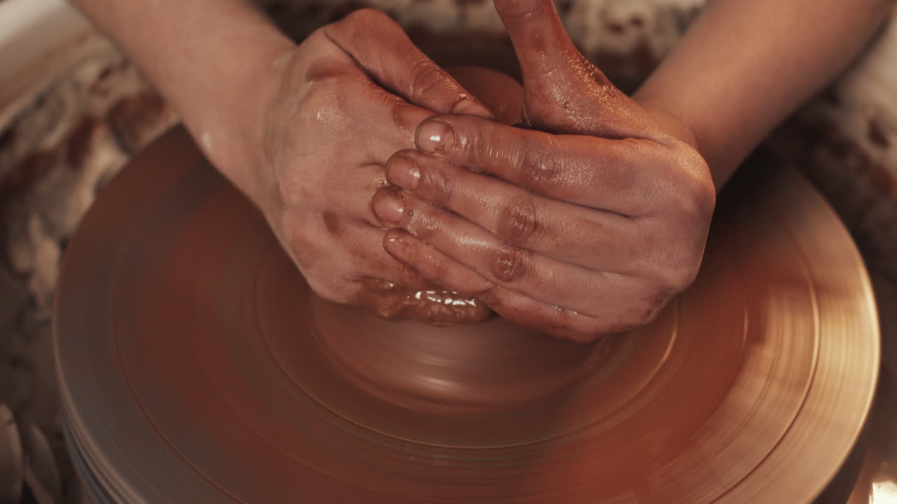 Pottery Wheel Shaping with Hands