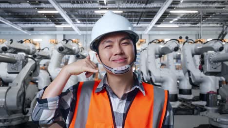 factory worker gesturing call