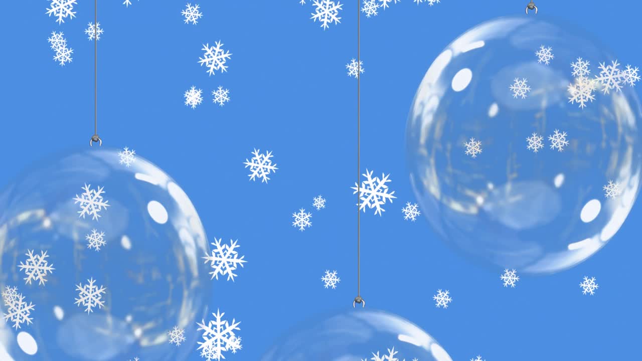 파란색 배경 위에 눈이 떨어지고 있습니다.