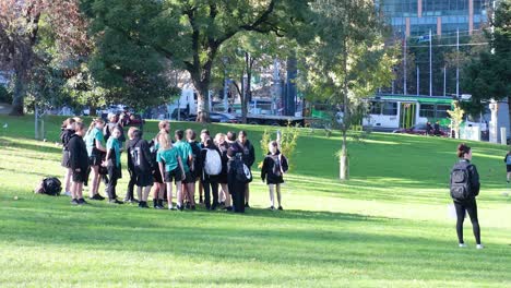 group of children interacting in a park