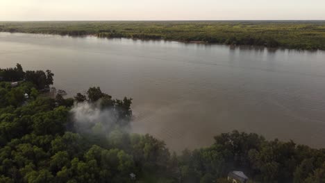 aerial footage of smoke over the amazon river and amazon rainforest, amazon fire