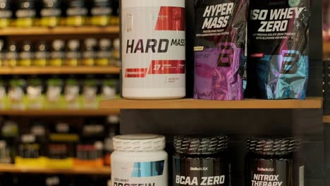 sport nutrition store interior with large choice of nutritional supplements.