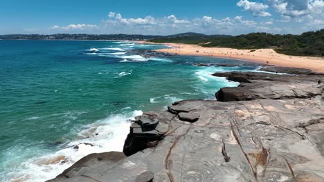 Aerial-Mastery:-Spoon-Bay's-Rocky-Coastline-Beside-Wamberal-Beach,-Central-Coast's-Nature-Reserve,-New-South-Wales,-Australia