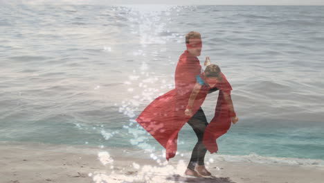 animación del mar sobre padre y hijo caucásicos felices divirtiéndose vestidos como superhéroes