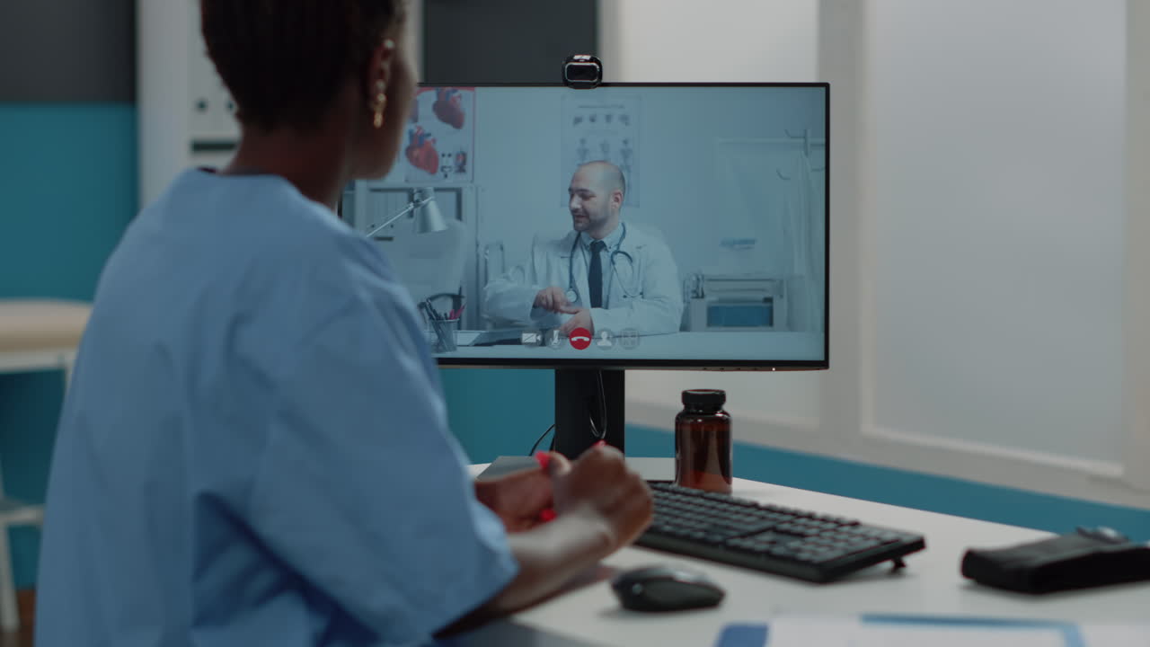 Nurse having video call with doctor