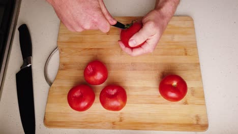 chef preparing tomatoes to eat