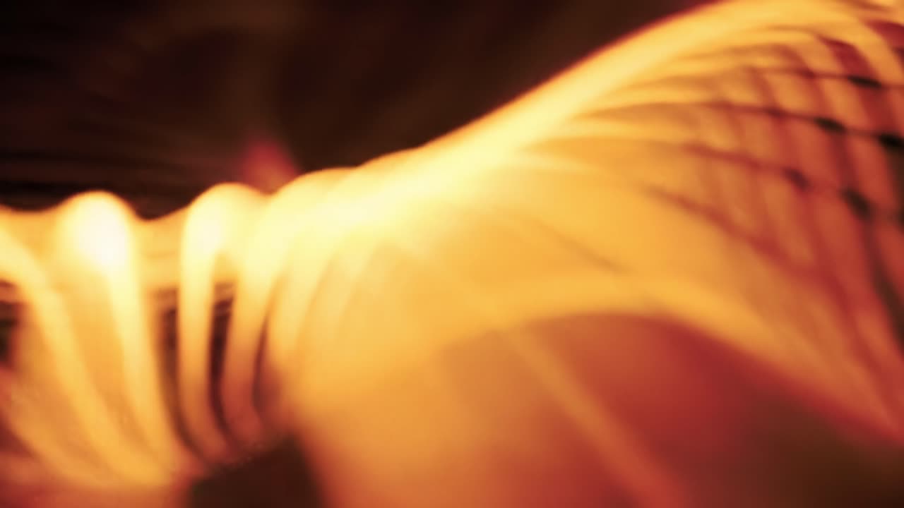 Dynamic light patterns create an enchanting visual experience. Swirling hues and curves invite viewers to contemplate the interplay of light and shadow in this captivating artwork.