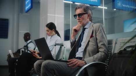 business people waiting at the airport