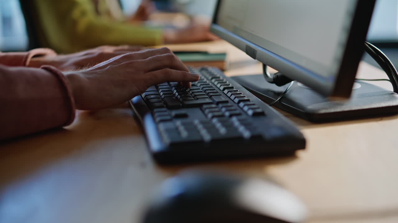 Manager hands entering data keyboard preparing email for client indoors closeup