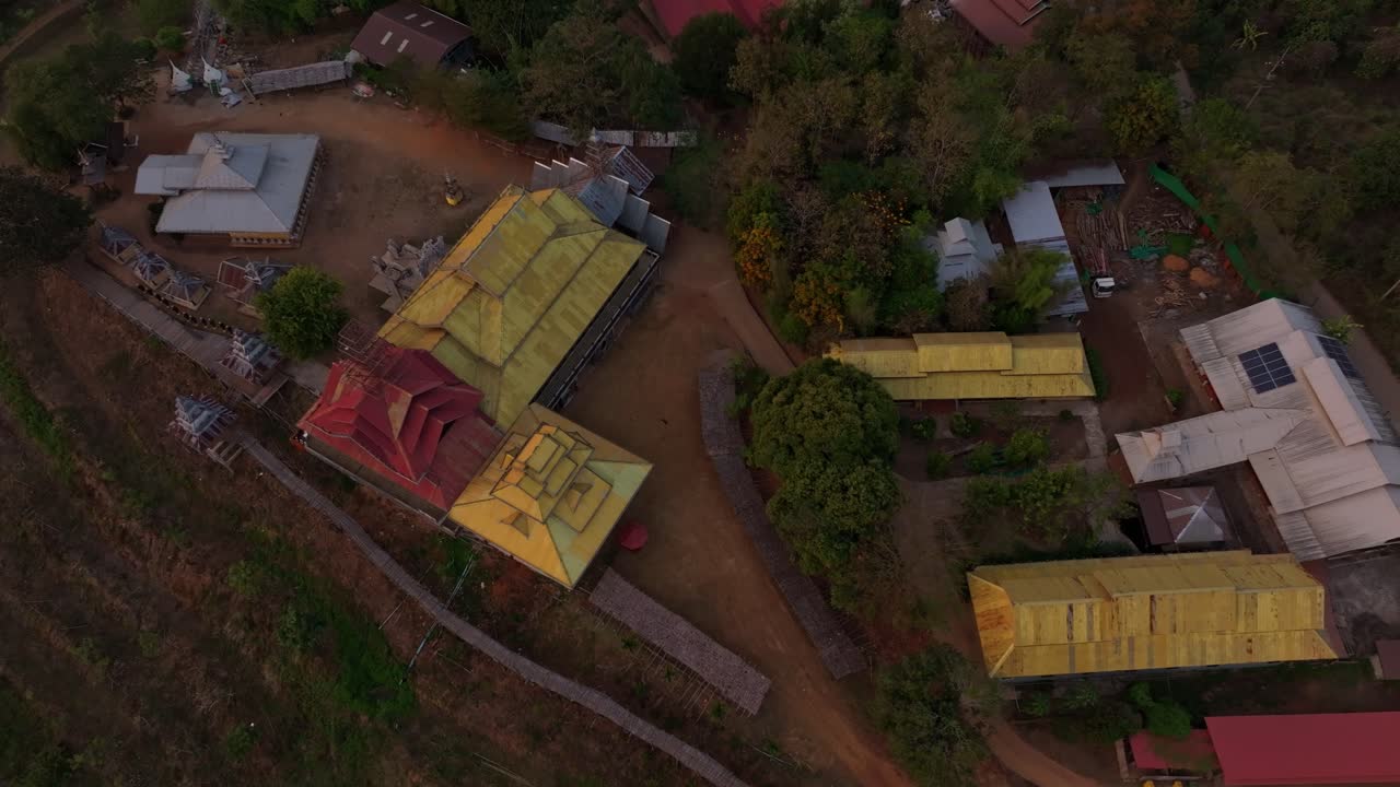 Traditional Thai temple glows beneath soft afternoon light, Thailand