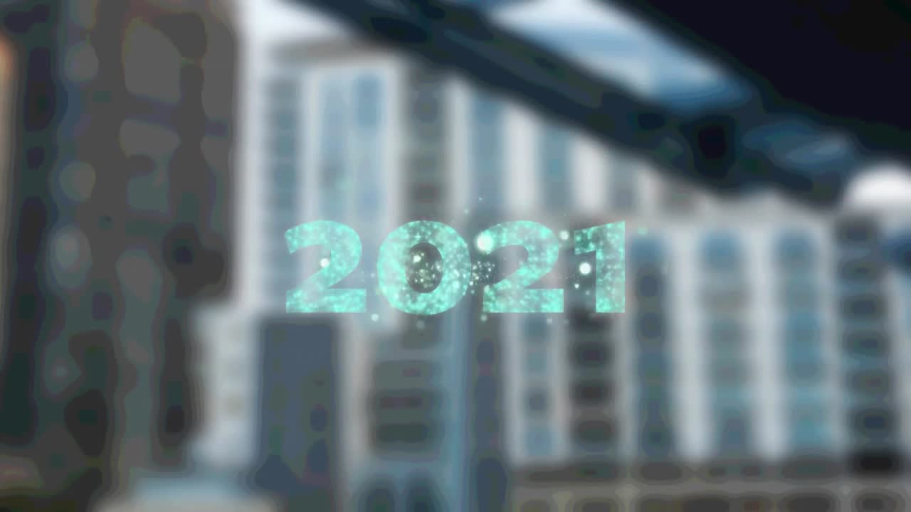 2021 text über feuerwerk, das gegen die luftaufnahme des stadtbildes platzt