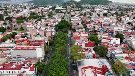 drone flight over avenida misterios from the instituto mier y pesado over the peripheral neighborhoods to the basilica of guadalupe in mexico city