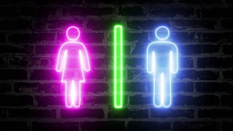 un letrero de neón parpadeante sobre una pared de ladrillo, con las formas de una mujer y un hombre, separados por una barra verde, que indica los baños