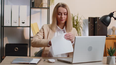 businesswoman girl open envelope letter reads it career growth advance promotion bank loan approve