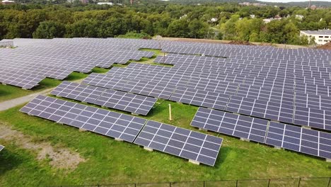 Aerial-wide-shot-pulling-back-over-a-solar-farm