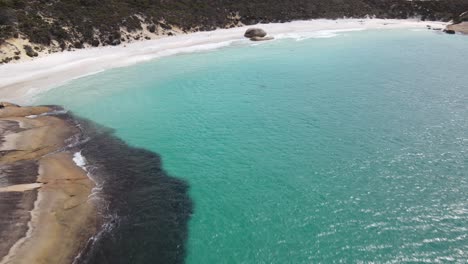 drone aerial moving towards little beach in western australia