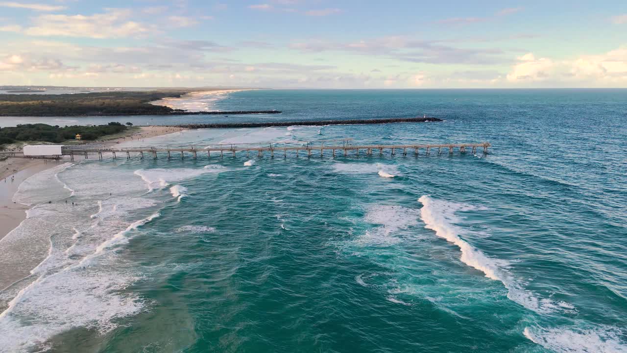 Ocean waves hitting pier at Gold Coast