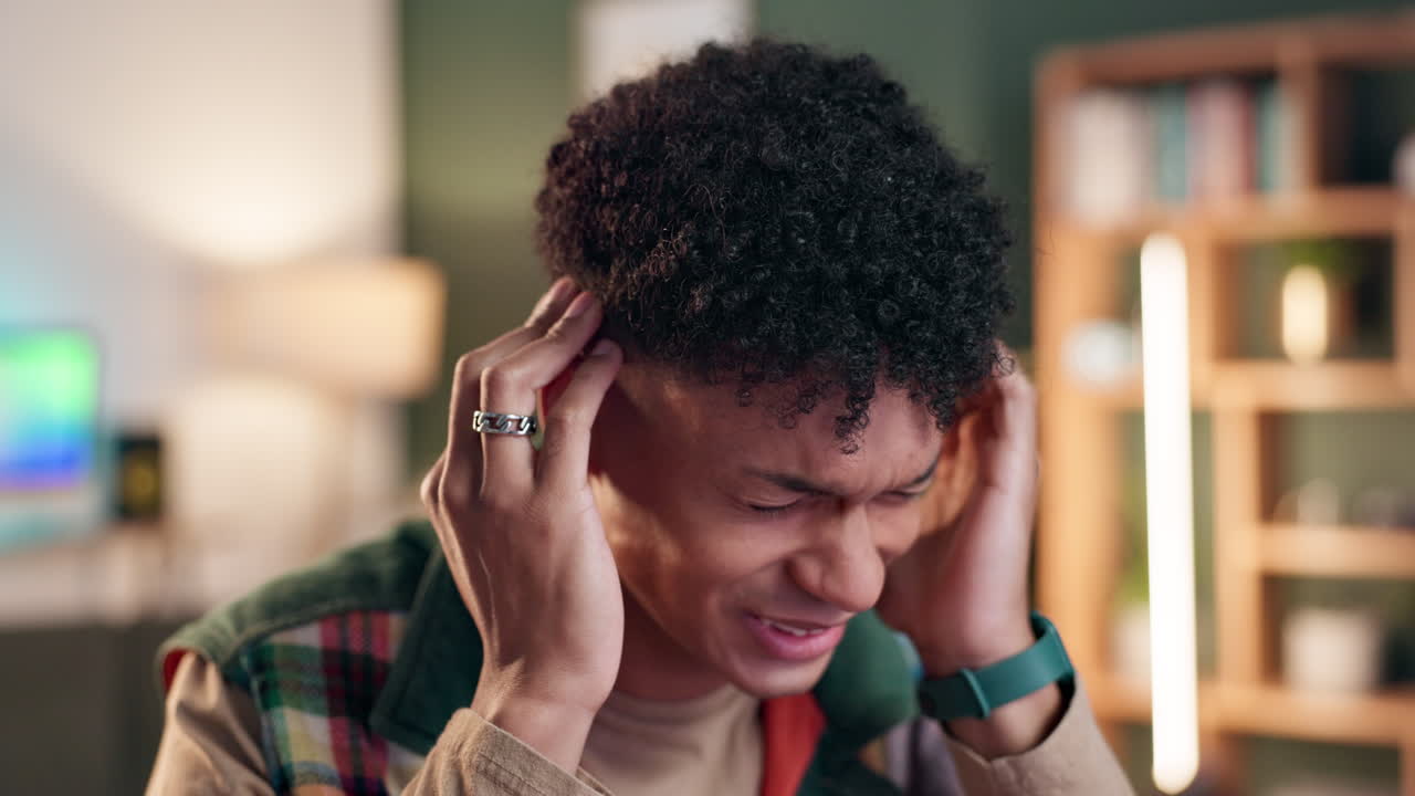 Man experiencing headache and stress