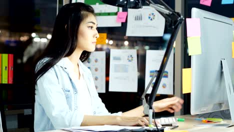 tired businesswoman work at office. she has been working since late night.