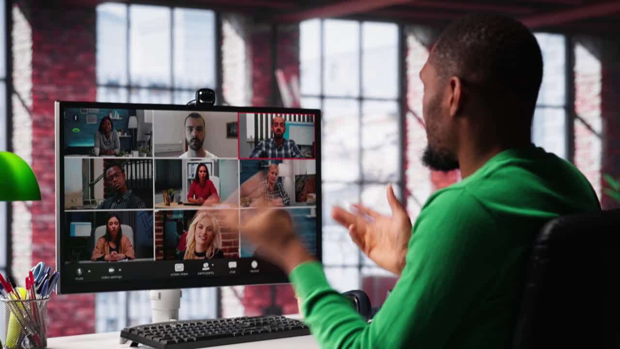 Vertical Video Manager talking to employees during web video call at home