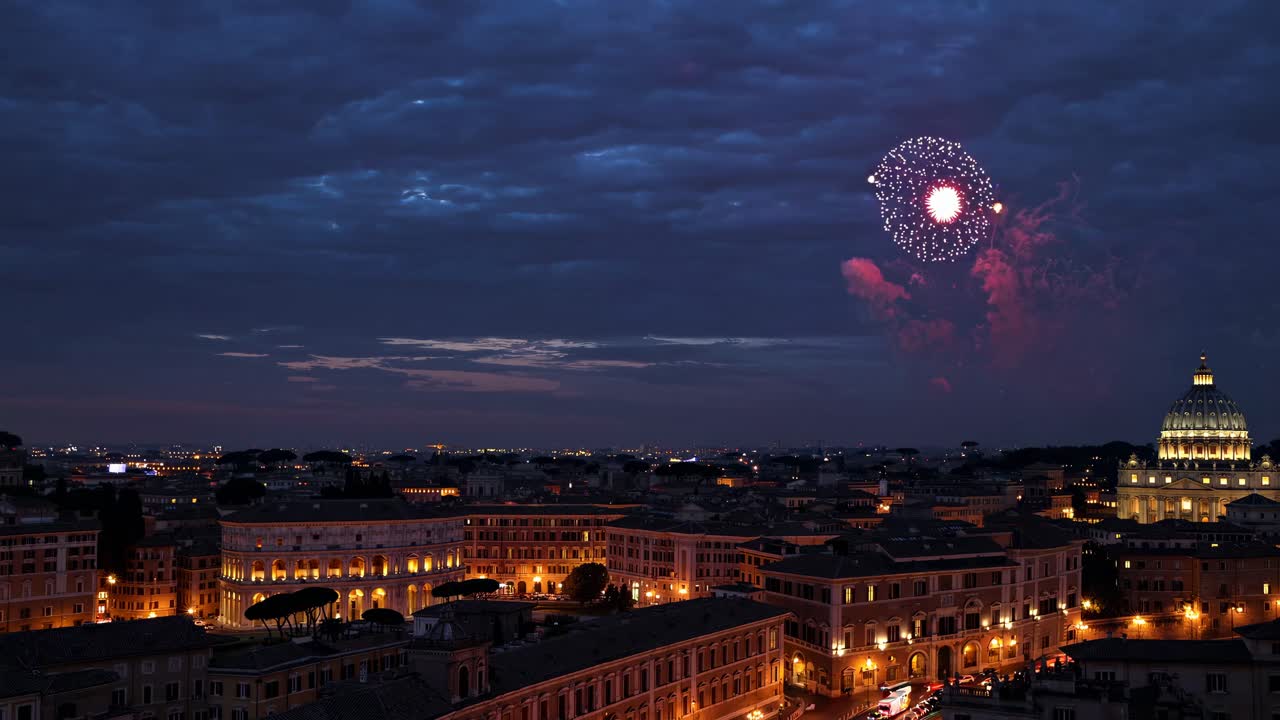 Aerial video view of a cityscape at night with vibrant fireworks illuminating the sky