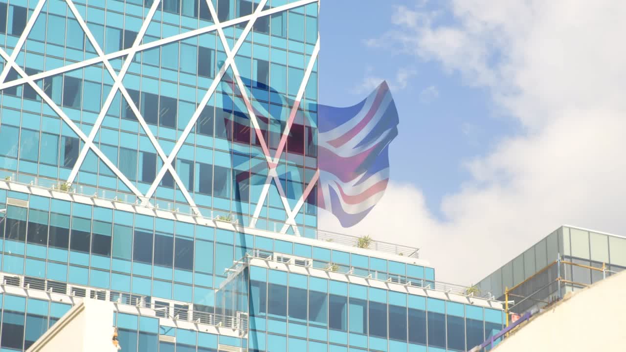近代的なオフィスビル上を覆うイギリス国旗のアニメーション