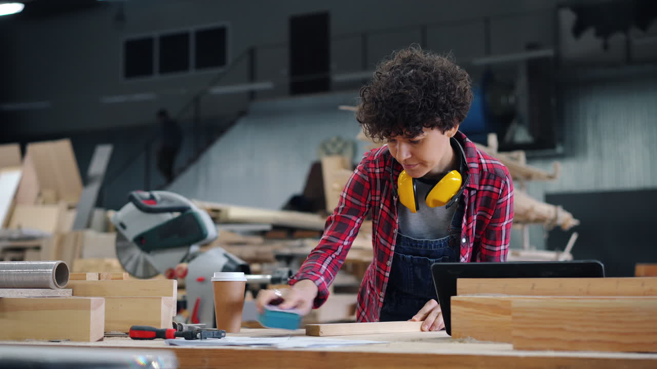 Woman Woodworker in Workshop