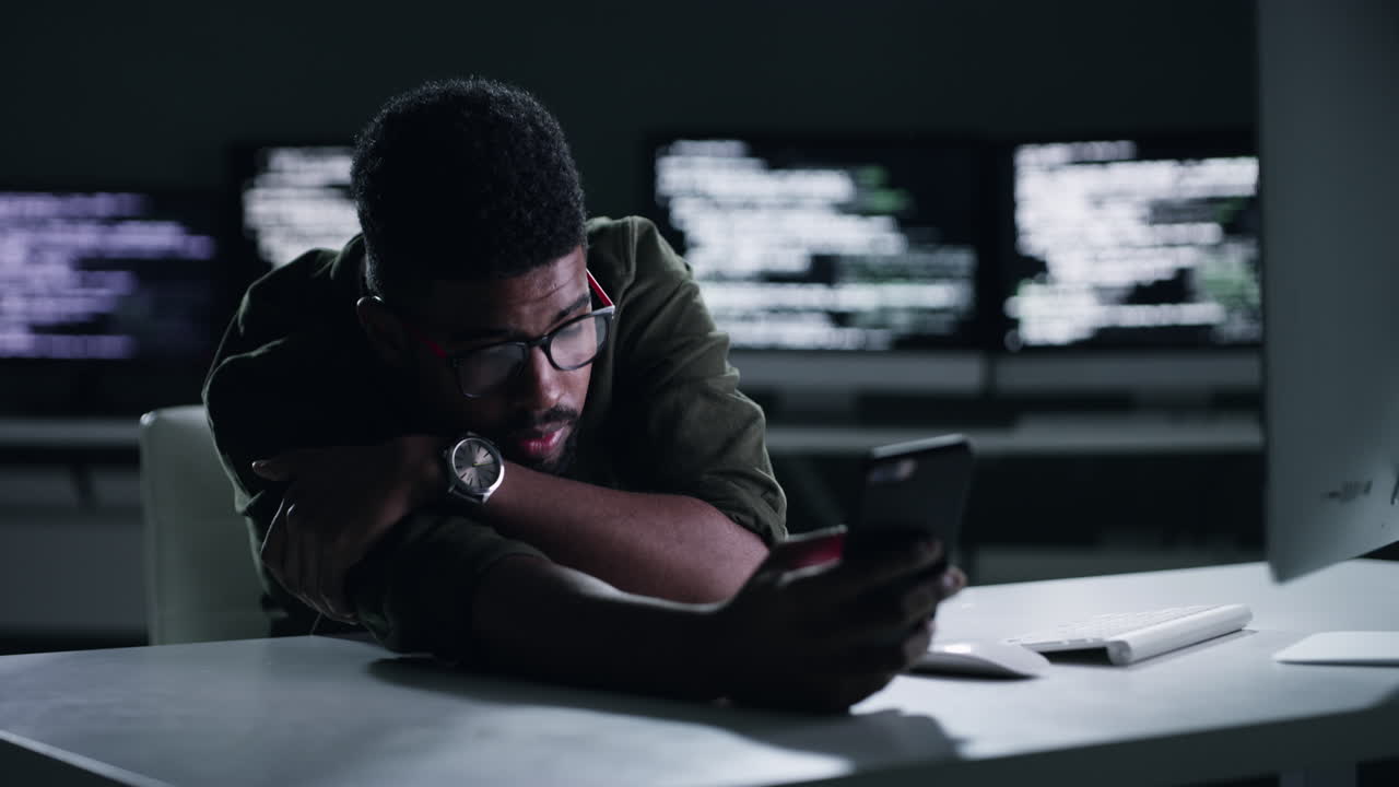 4k footage of an tired young male programmer