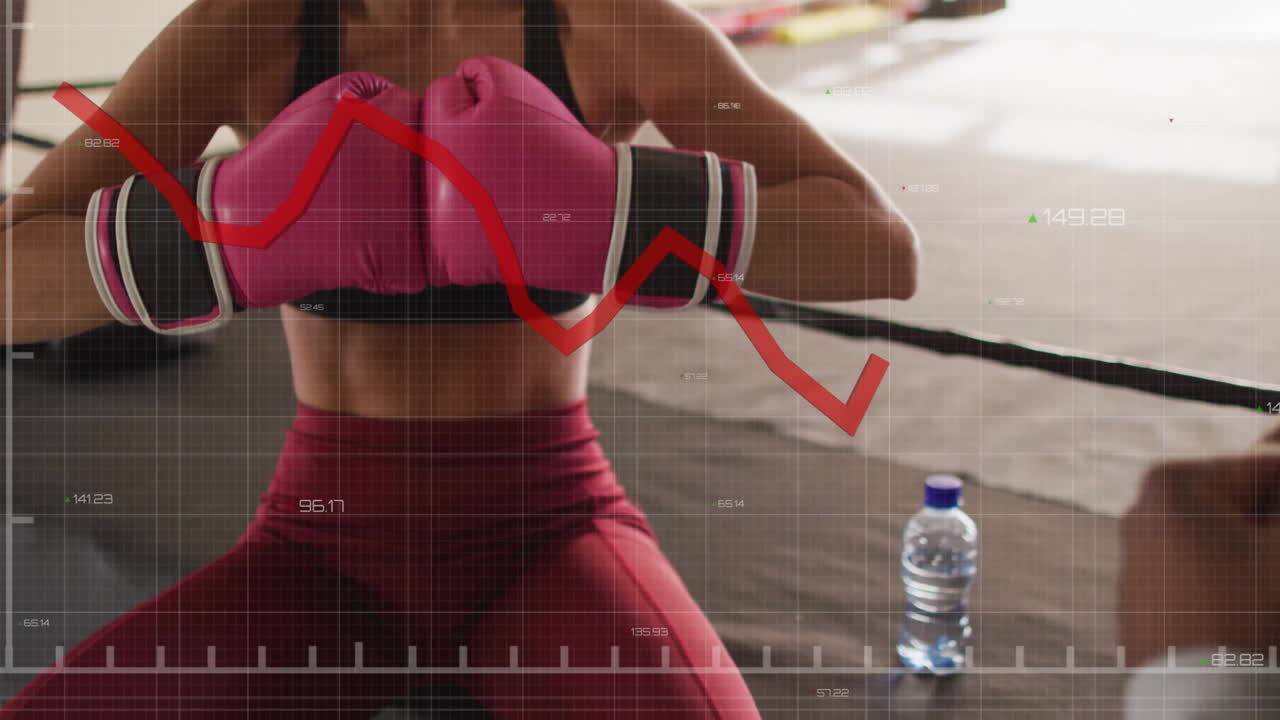 boxeador con guantes rosados entrenando con animación de datos financieros sobre la escena de entrenamiento