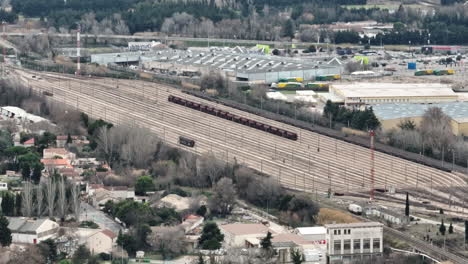 bird's-eye perspective of avignon's bustling railway heart, seamlessly blending