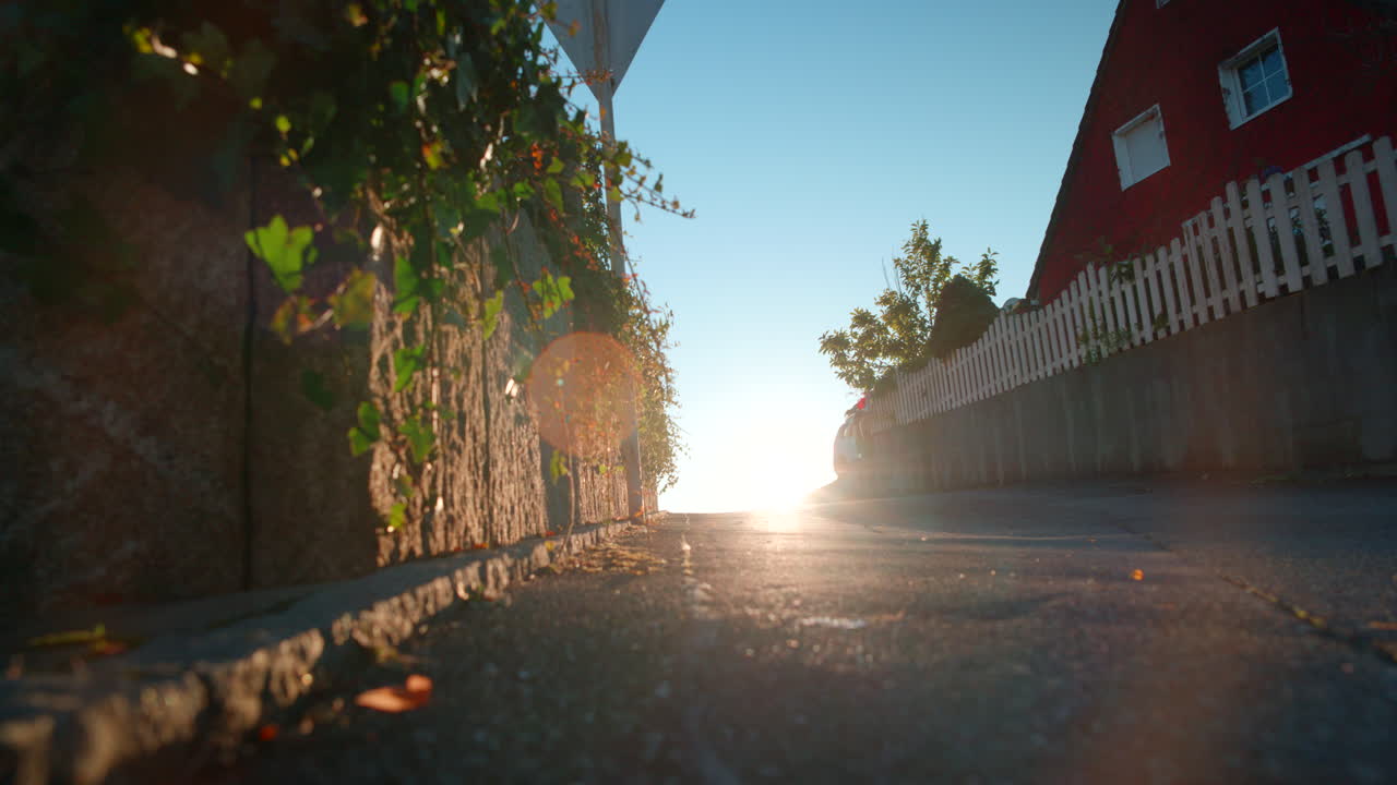 Heavenly light shining along the early morning path in village in Schönaich Germany, Europe
